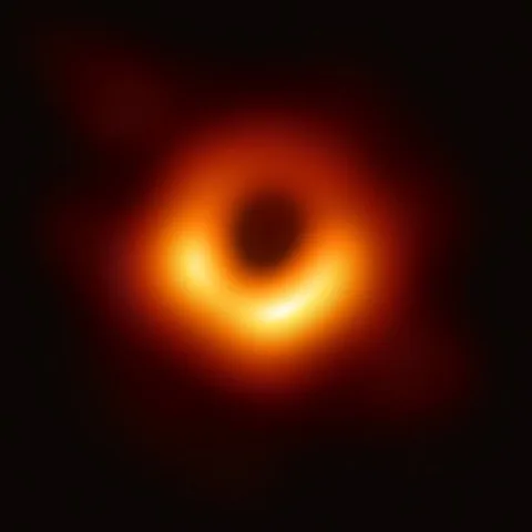 The Event Horizon Telescope image of the black hole at the centre of M87: a bright, uneven ring of orange light around a dark centre